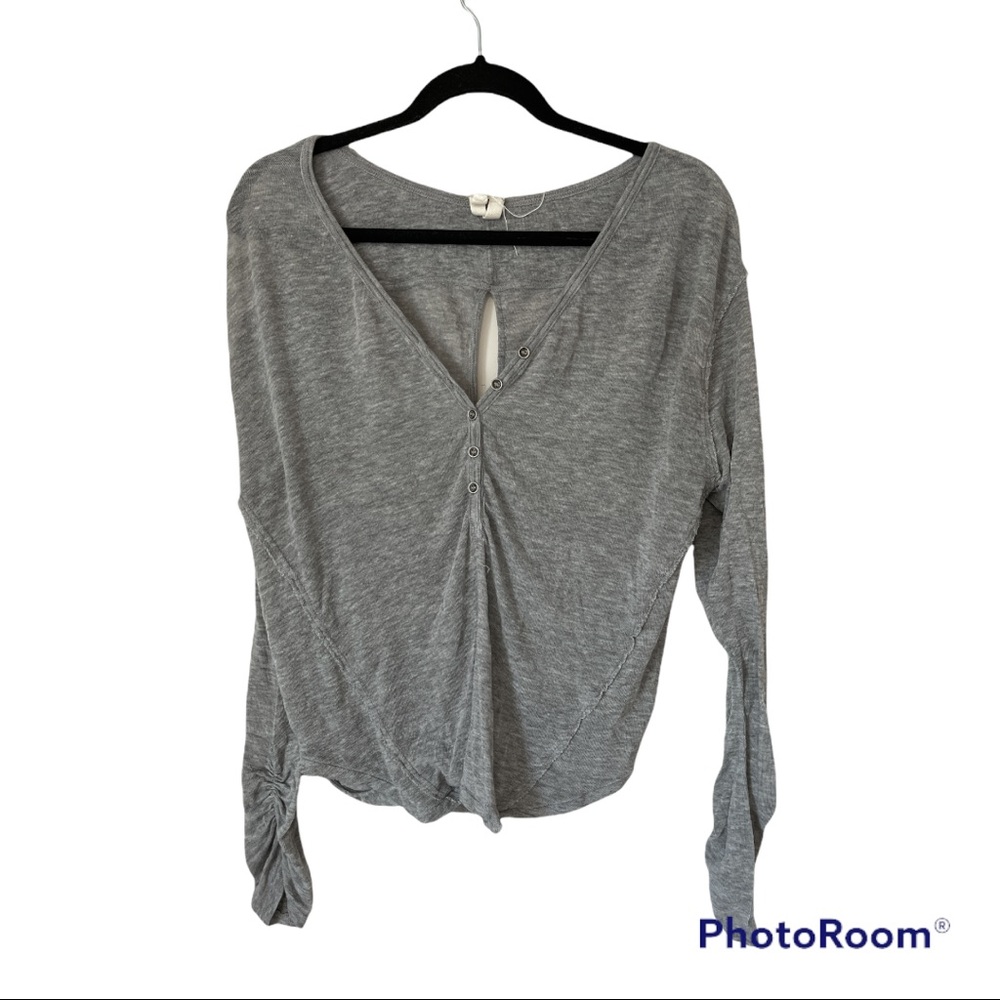 Long sleeve free people top with open slot in back